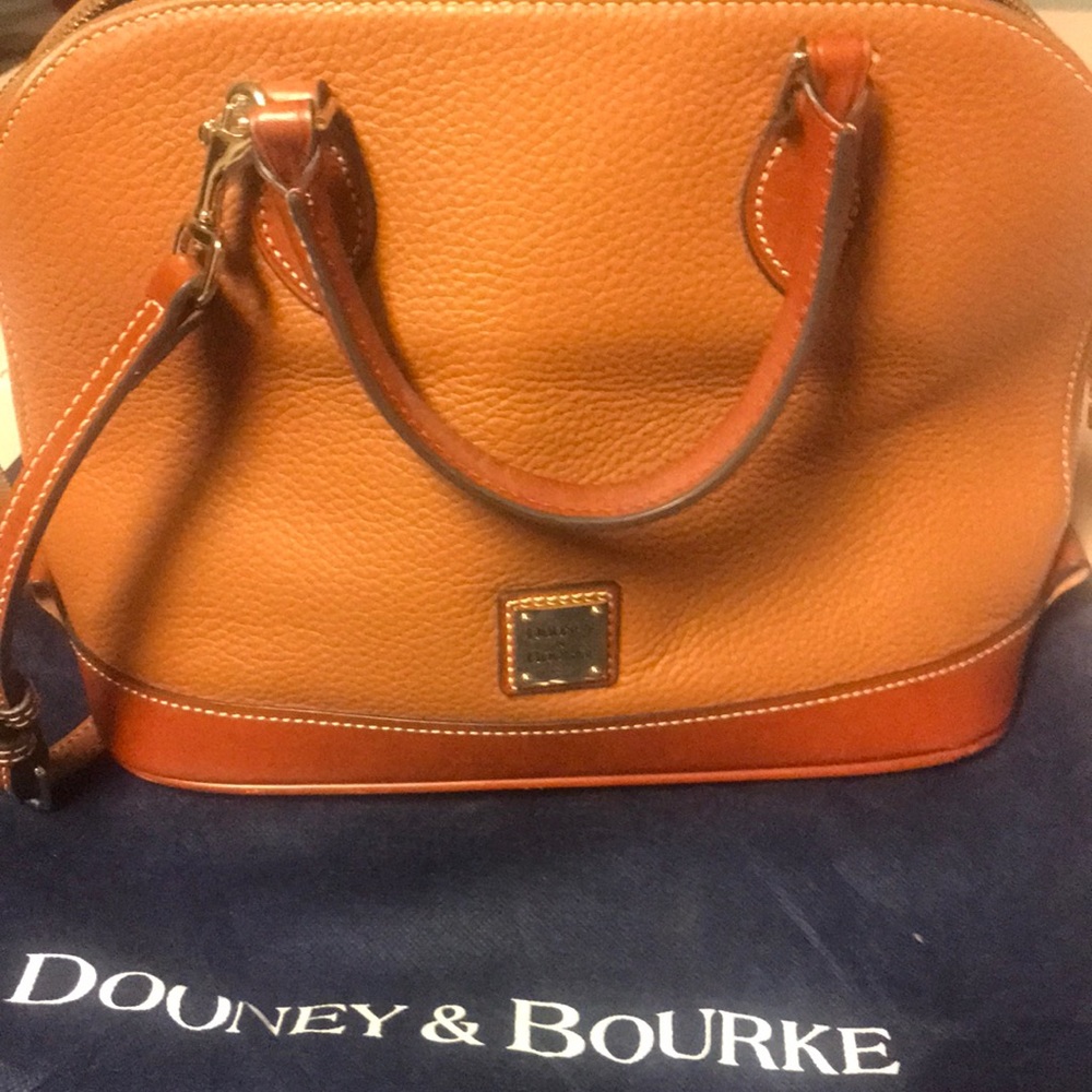 Handbag with handles and shoulder strap